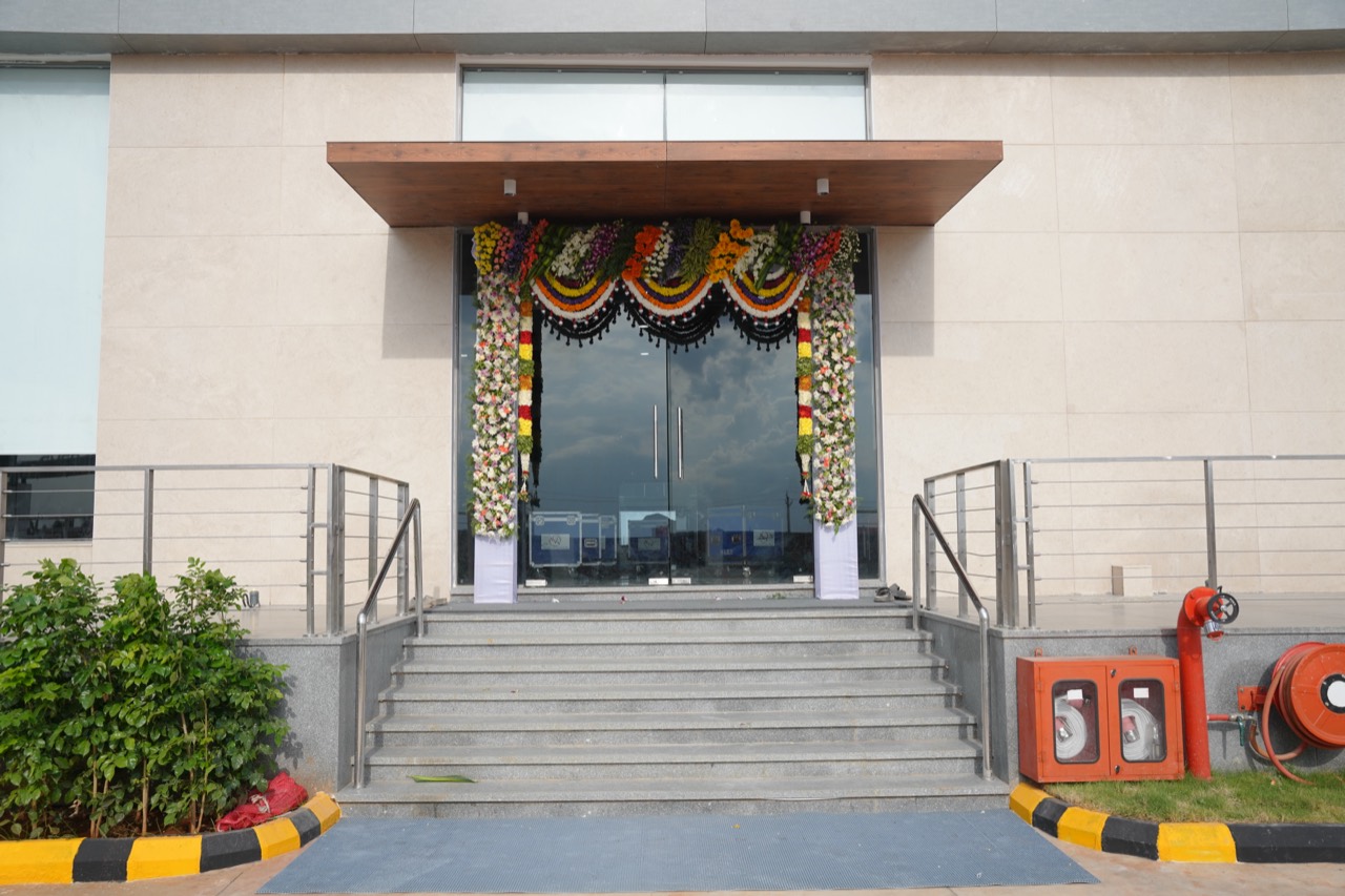 Main entrance with floral welcome